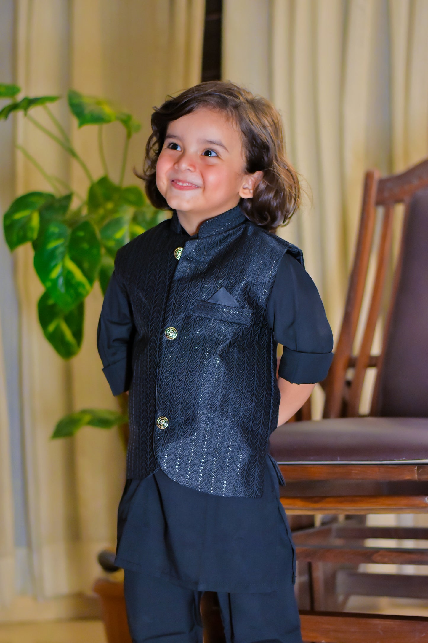 Black sequence waistcoat with black kurta pajama