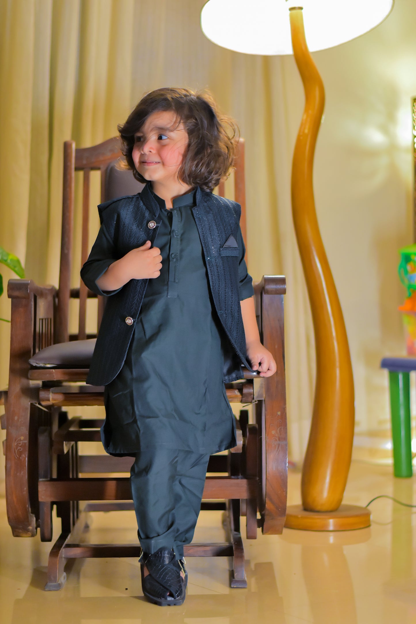 Black sequence waistcoat with black kurta pajama