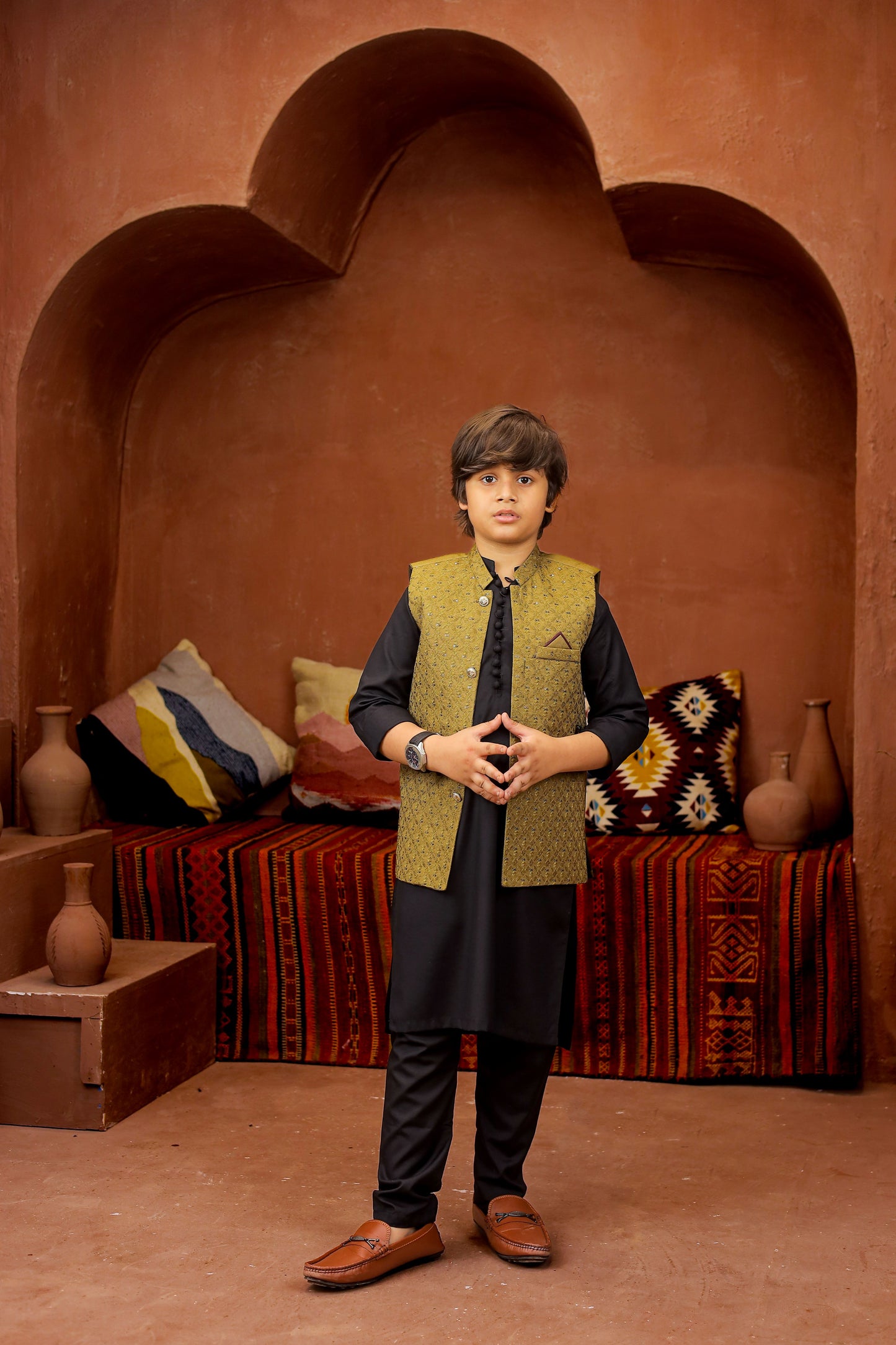 Golden waiscoat with black kurta pajama