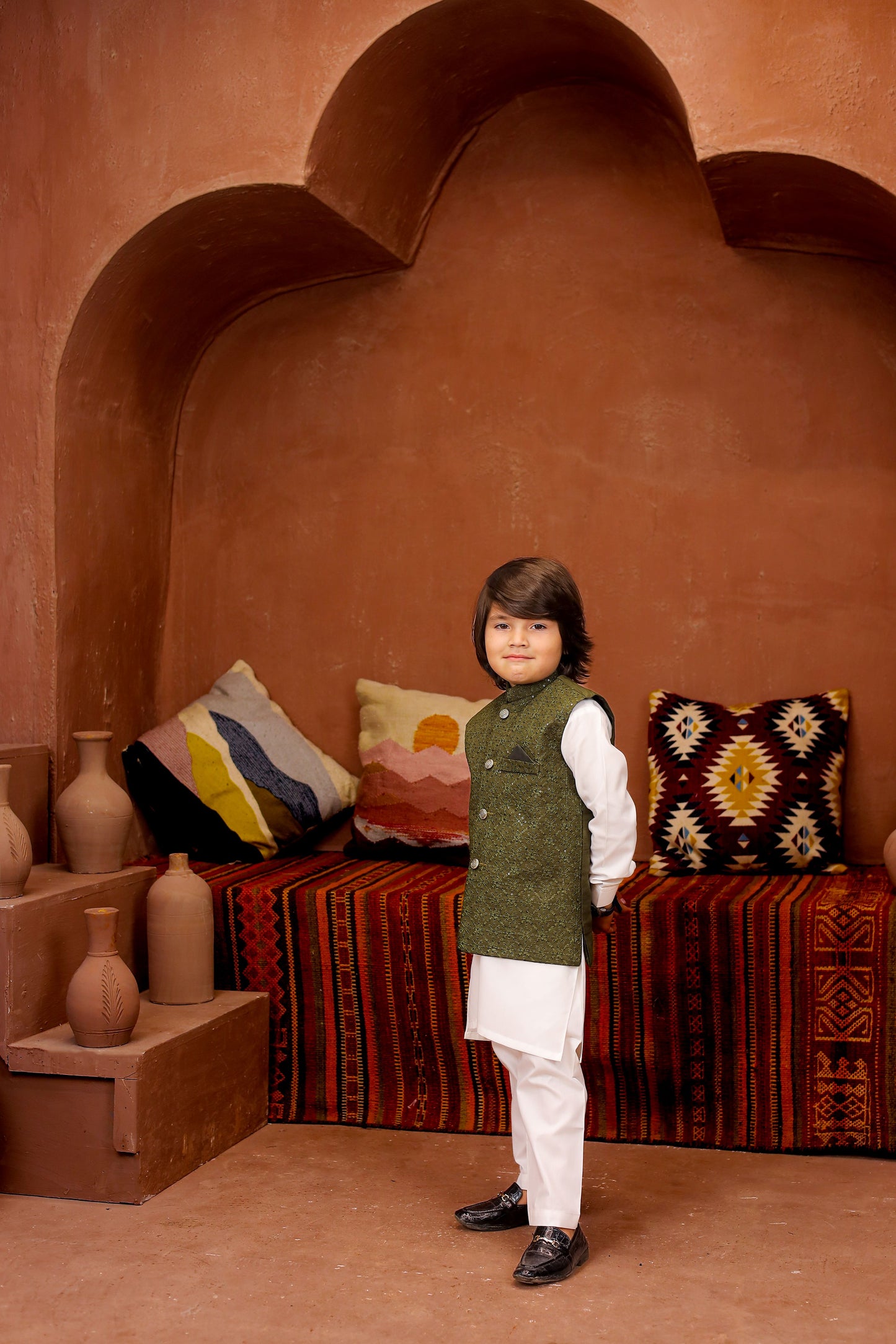 Green waiscoat with white kurta pajama