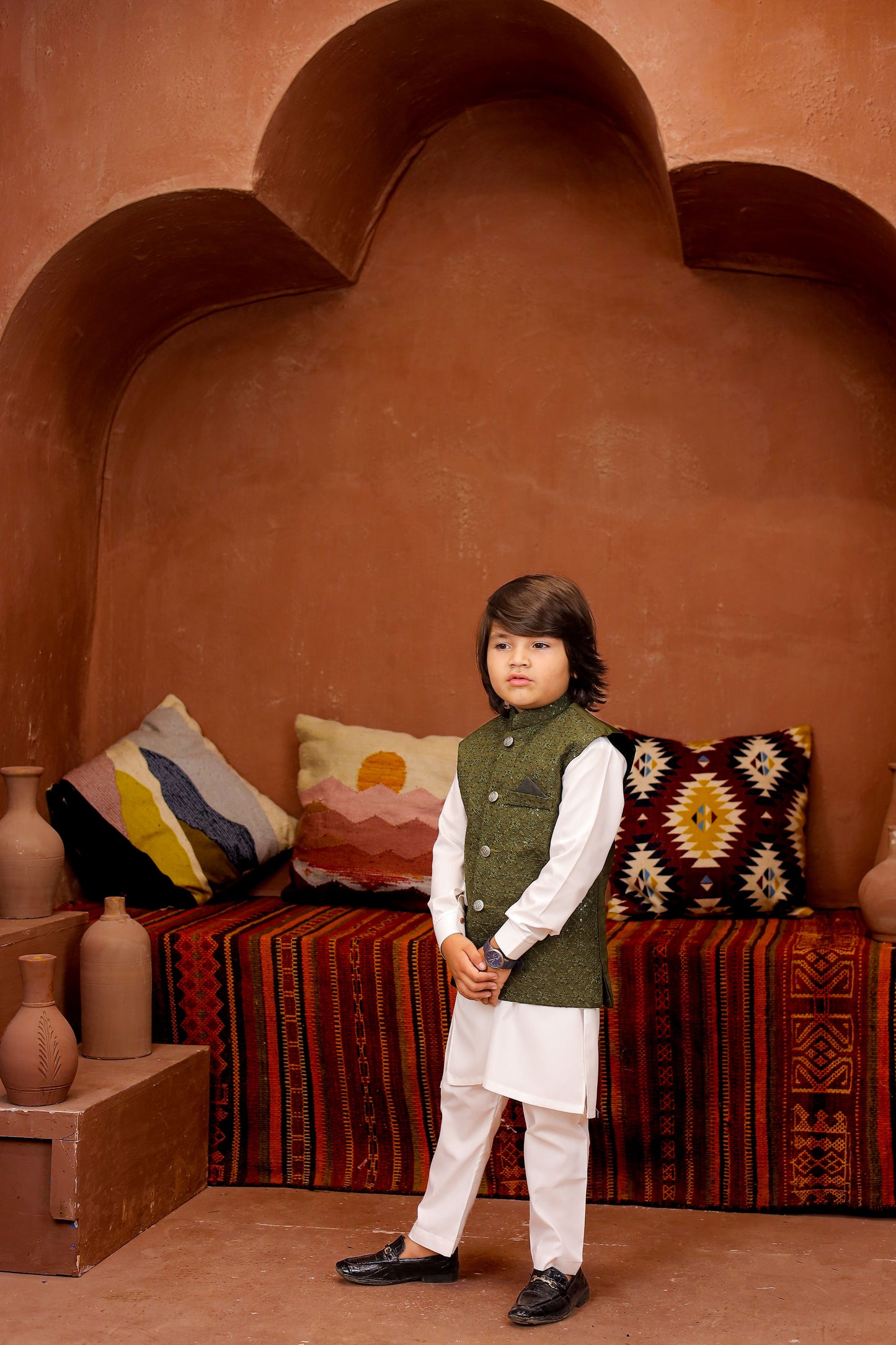 Green waiscoat with white kurta pajama