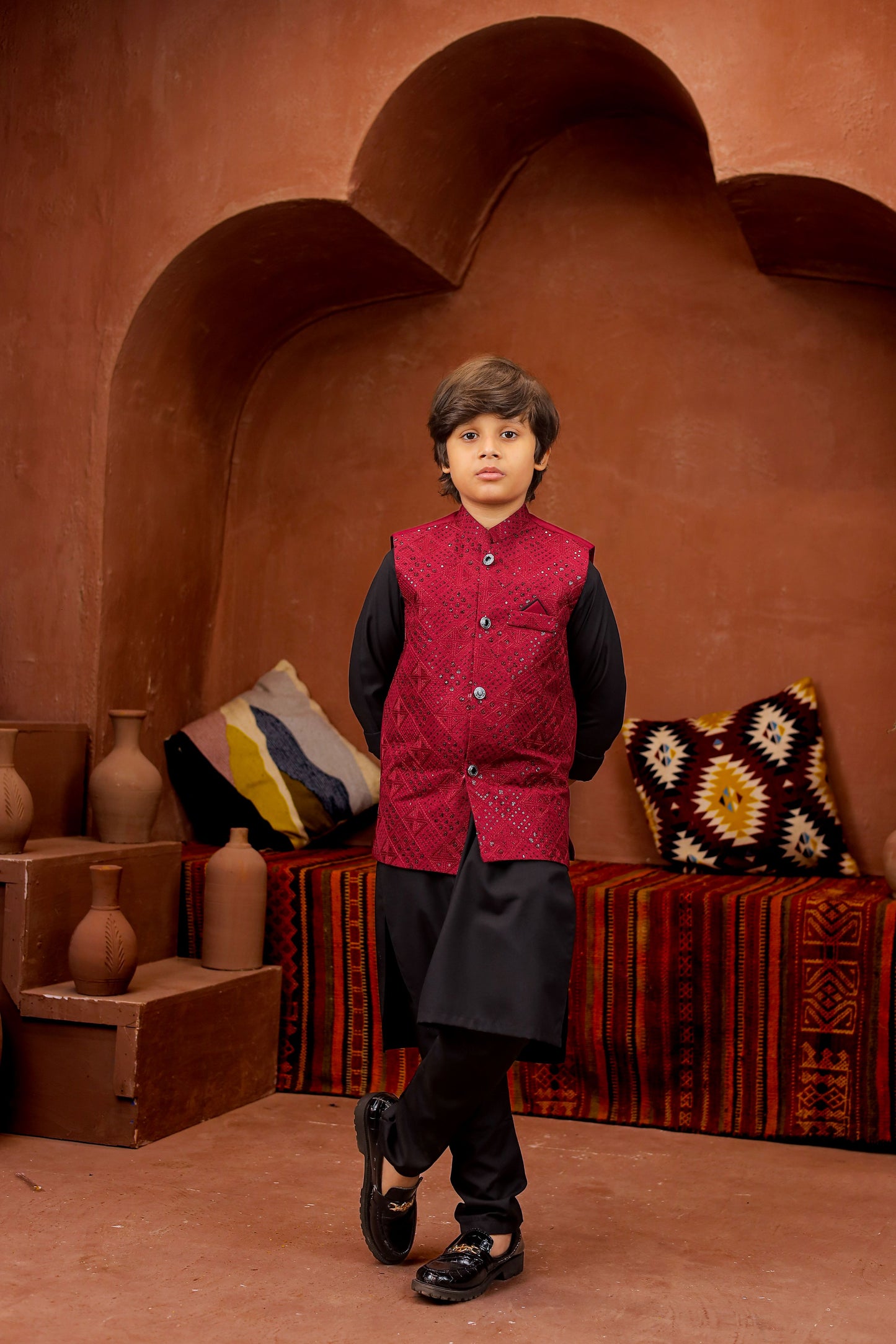 Maroon waiscoat with black kurta pajama