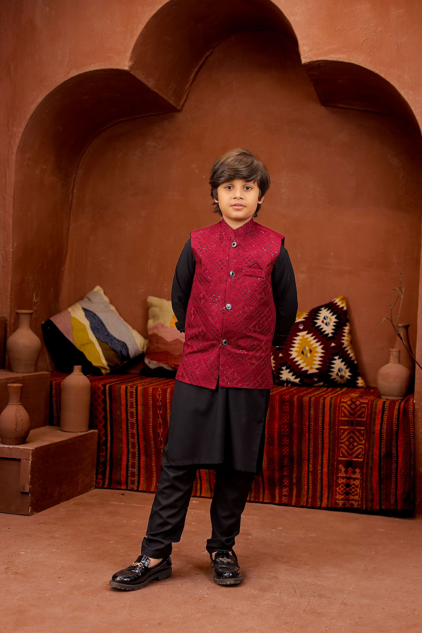 Maroon waiscoat with black kurta pajama
